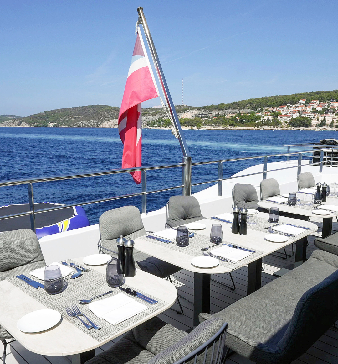 Yacht deck with restaurant place settings