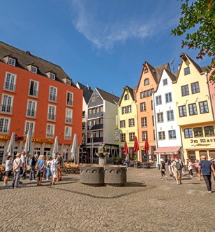 Colourfully painted buildings in Cologne square