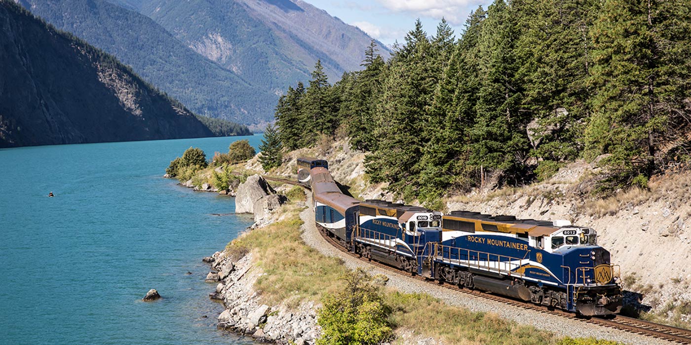 Rocky Mountaineer Train on track next to sea