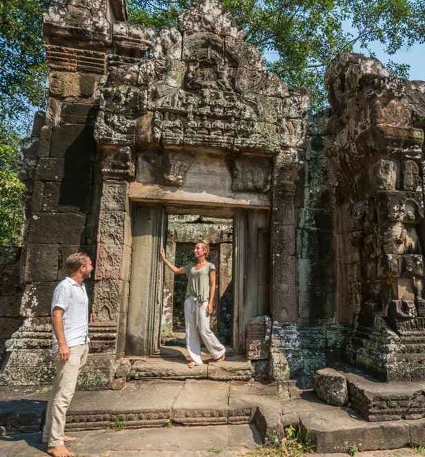 Couple exploring Angkor Wat, Cambodia