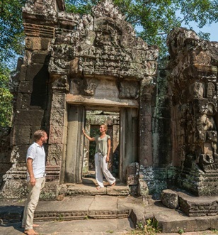 Couple exploring Angkor Wat, Cambodia