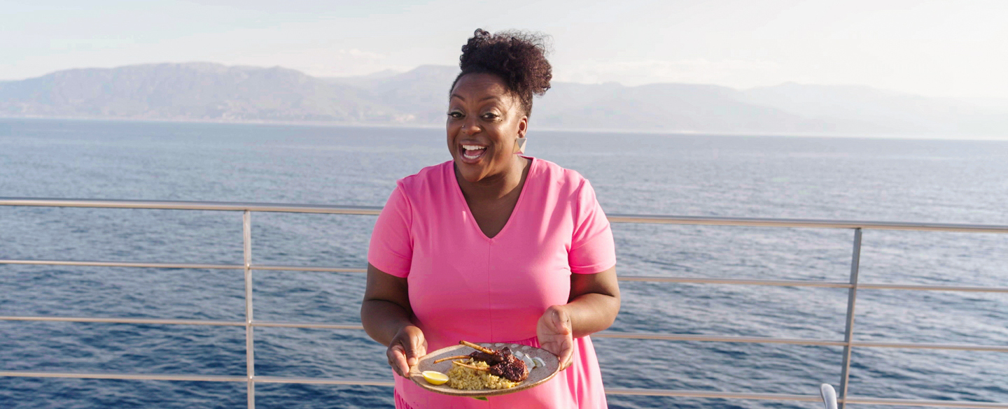 Judi Love with a meal made on her Emerald Azzurra culinary cruise 