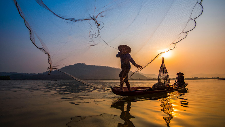 Local fisherman in Southeast Asia at sunrise