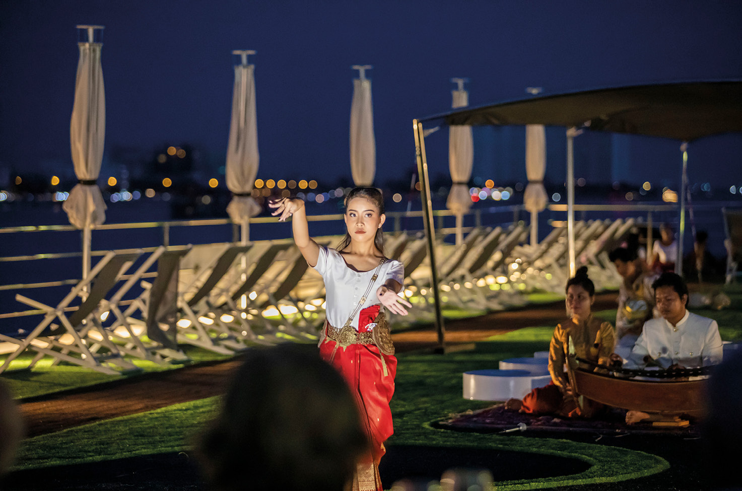 Aspara Dance taking place on Emerald Harmony Sun Deck along the Mekong River