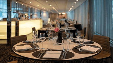 Stylish restaurant on board a luxury river ship sailing the rivers of Europe