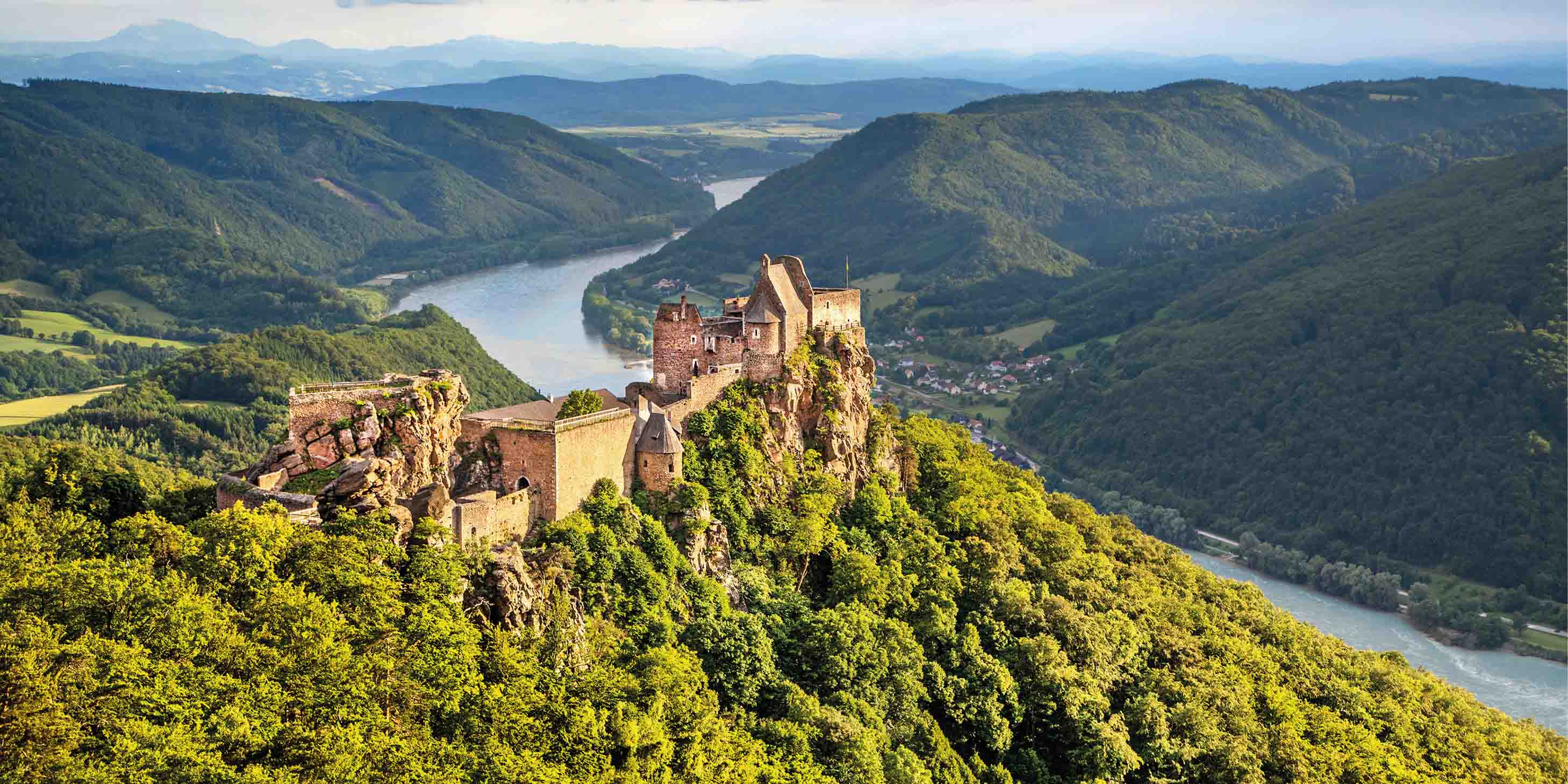Durnstein Castle on top of a green hill in the Wachau Valley of Austria on the banks of the Danube River