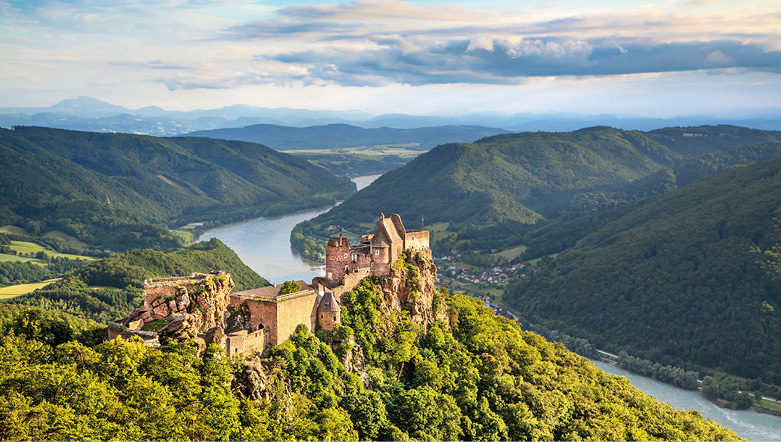 Durnstein Castle on top of a green hill in the Wachau Valley of Austria on the banks of the Danube River